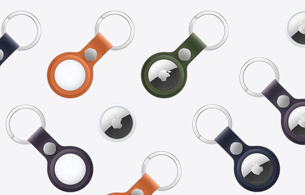 AirTag e chaveiro de tecido FineWoven para AirTag disponível em várias cores. O acessório cobre a borda externa e exibe a parte da frente com o logotipo da Apple ou a parte de trás branca