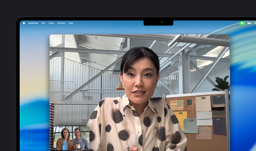 A video call on MacBook Pro, a woman talks to two people on the call, Centre Stage keeps her centred in the frame