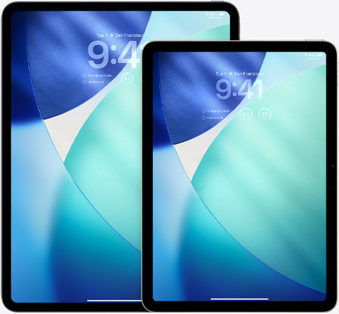 iPad og iPad Air side om side. iPad Air er forrest og overlapper med iPad i lodret position. Låseskærmen viser klokkeslættet i transparent Liquid Glass.